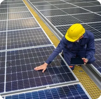 A man fitting solar panels